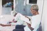 Apu Kalsarap Nemaf and Ati Limaas Kalsarap reading a dictionary of their language. Erakor village, Vanuatu, 2001.